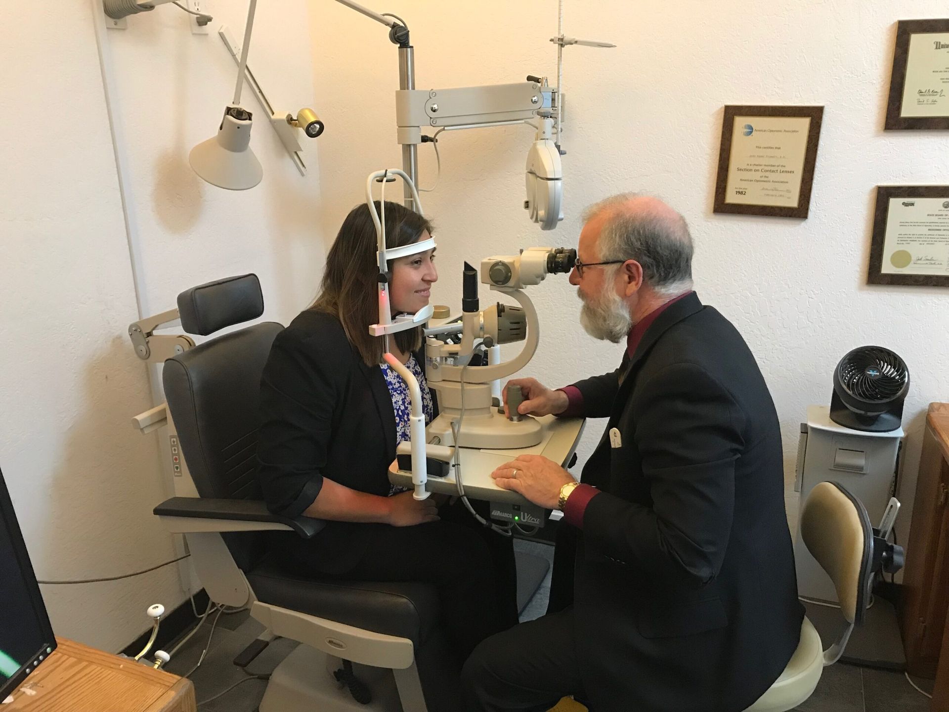 Dr. Prewett examining a patient at the slit lamp